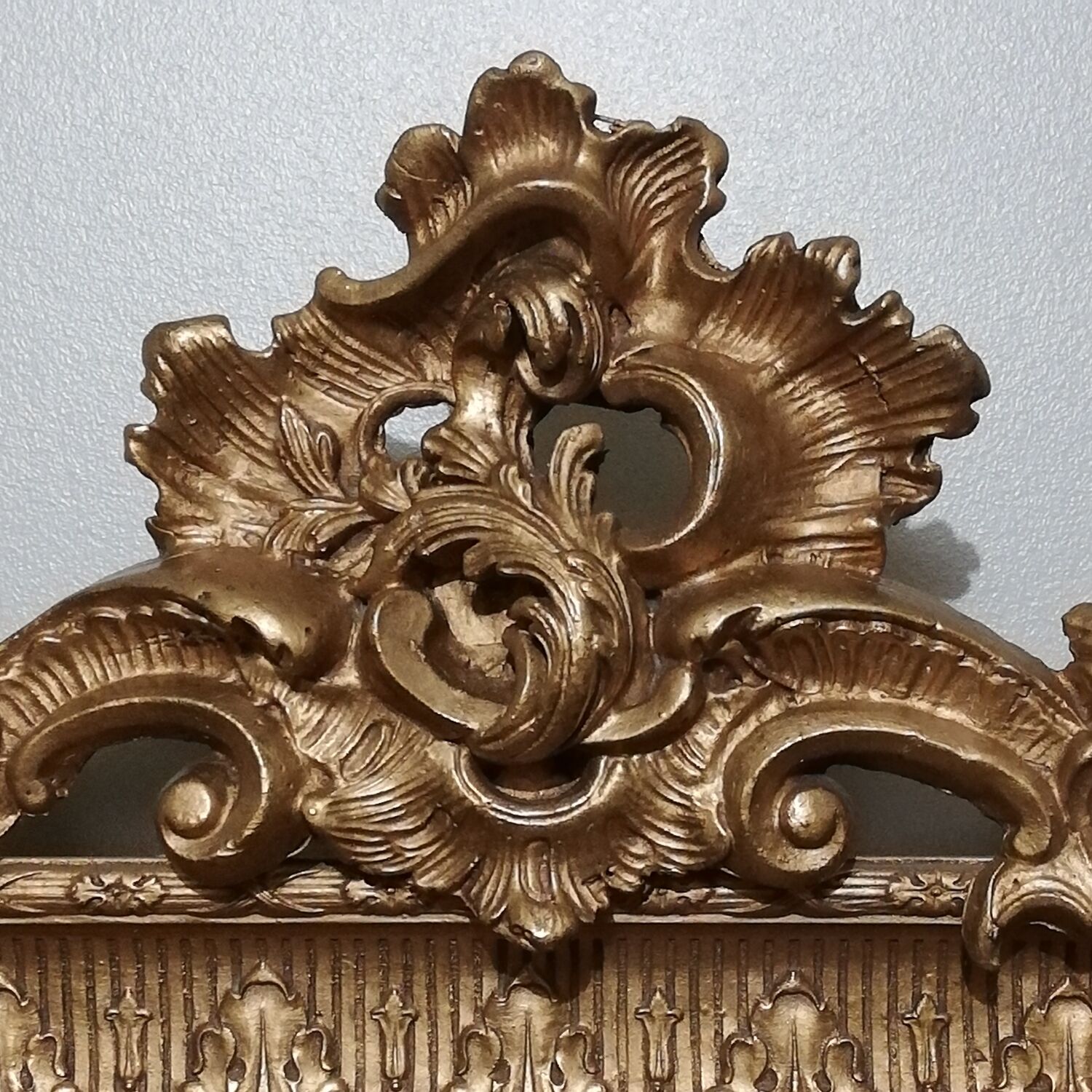 Mirror with pediment rocaille in gilded wood and stucco Louis XV style