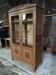 Vintage rococo oak bookcase with 2 glass doors.