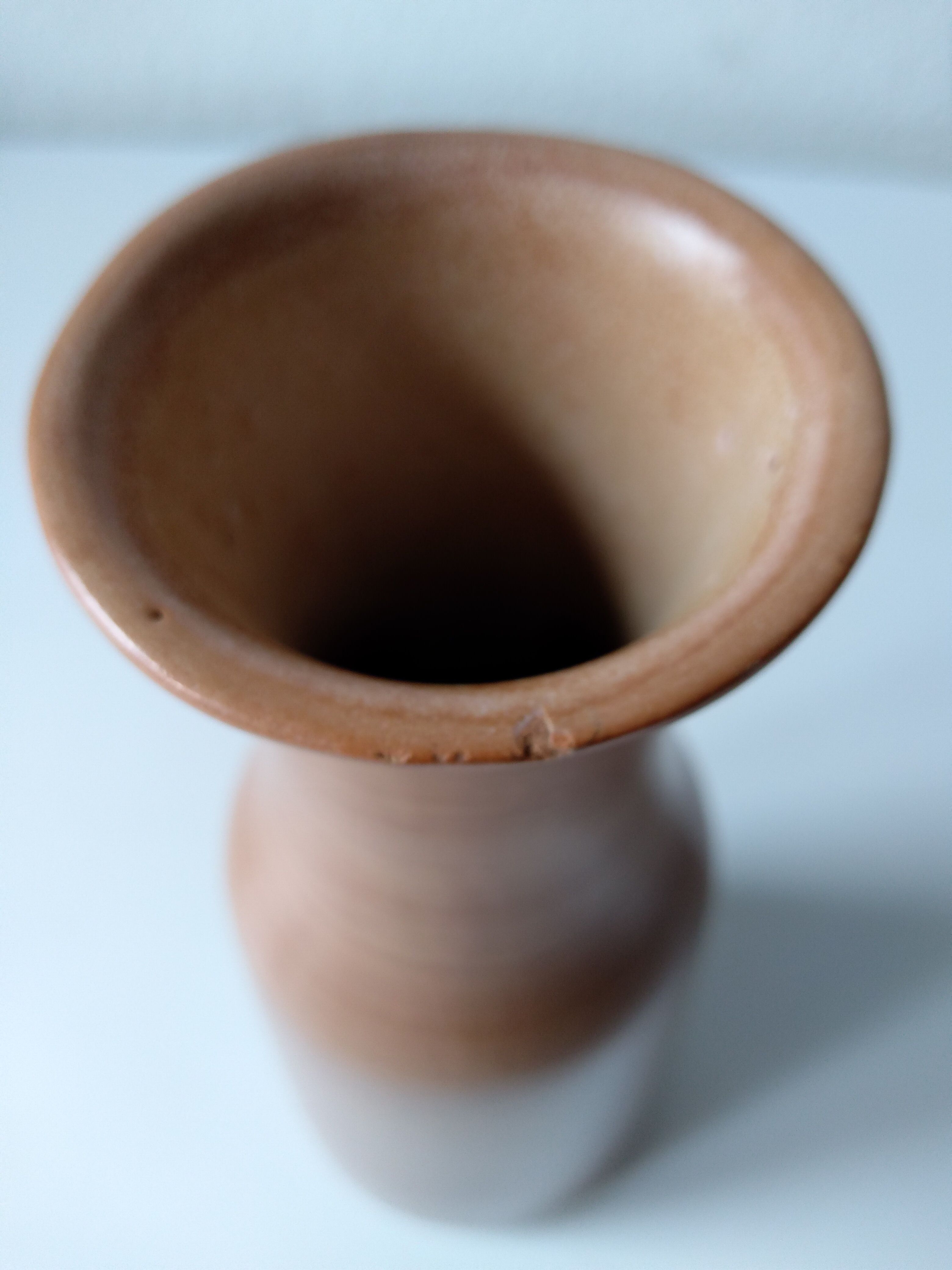 Handmade terracotta vase in terra cotta color