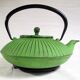 Flat cast iron teapot