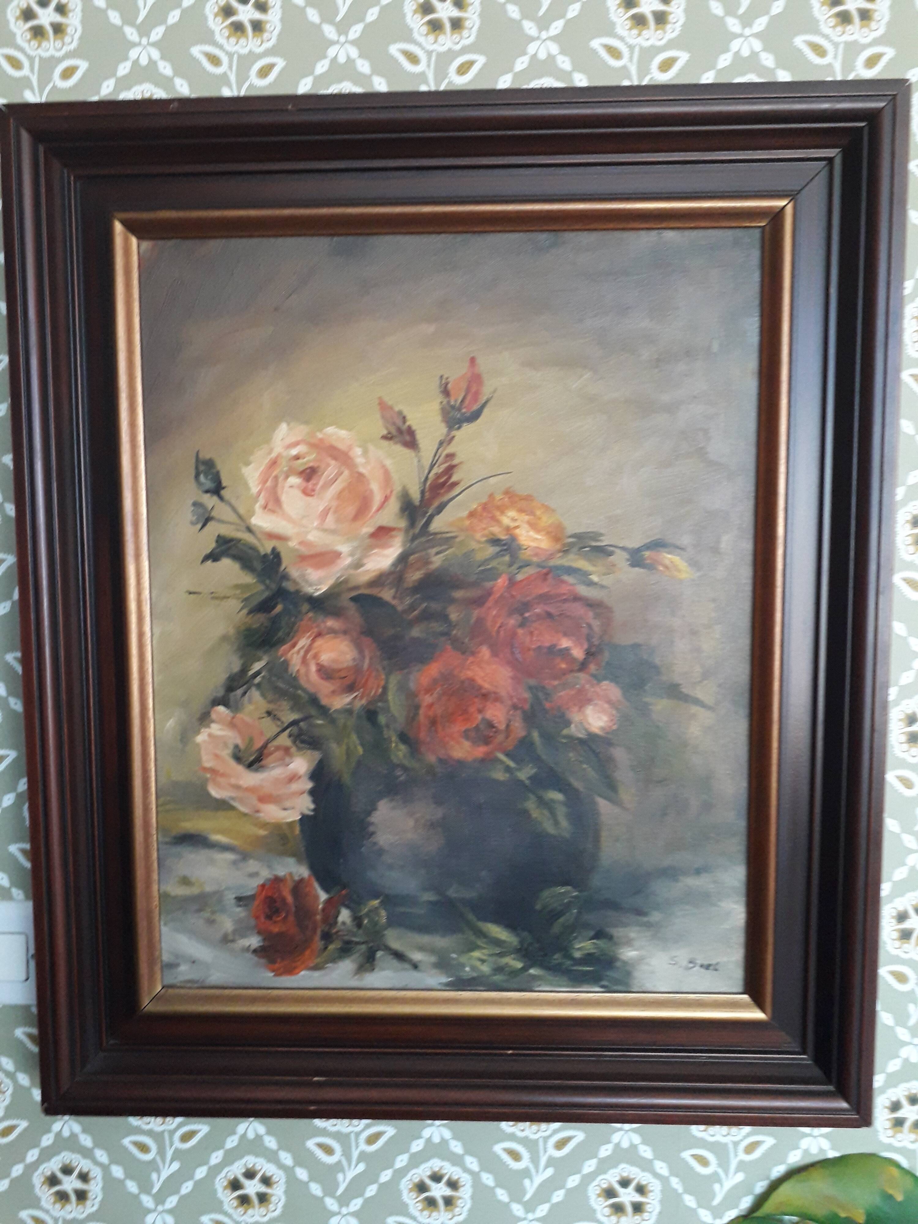 Antique oil painting depicting a bouquet of roses