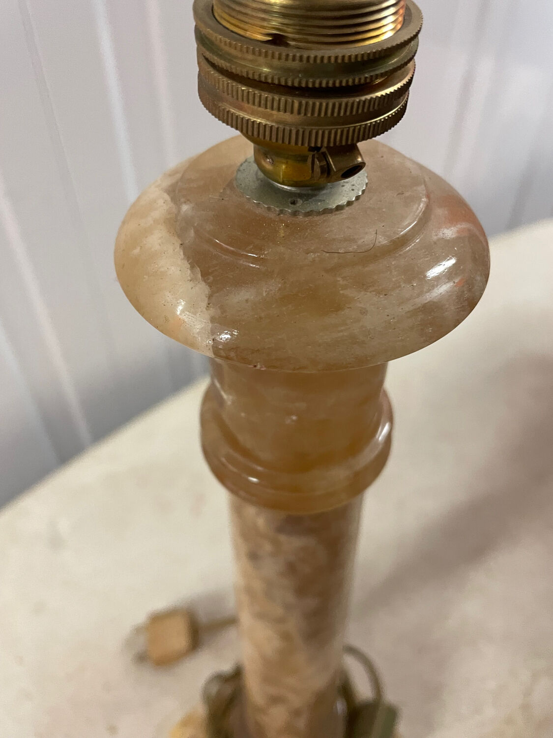 Pair of candlesticks in yellow sienna marble