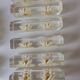 12 knife rests with resin inclusion. 1970s.