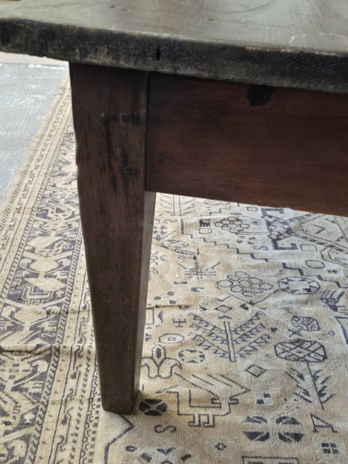 Rustic farmhouse coffee table from the 1900s with two drawers.