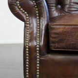Cognac colored brown grained cowhide chesterfield armchair