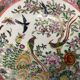 China, polychrome porcelain plate bird of paradise 20th century