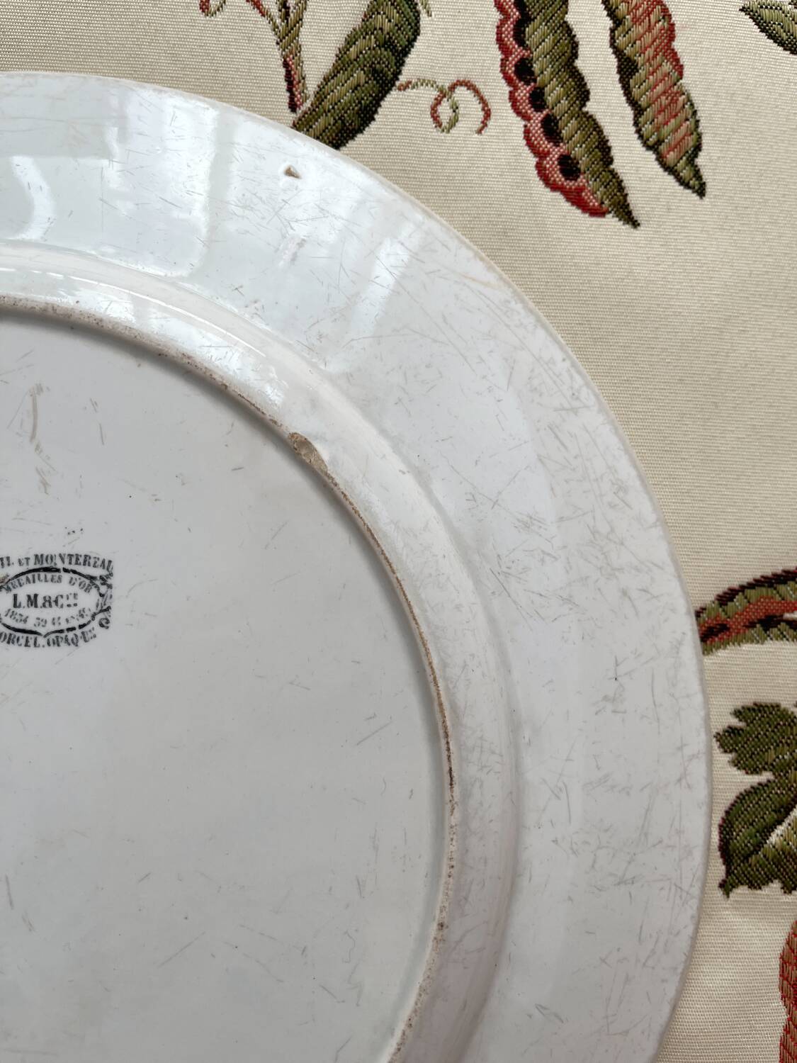Round white ironstone dish from Creil and Montereau