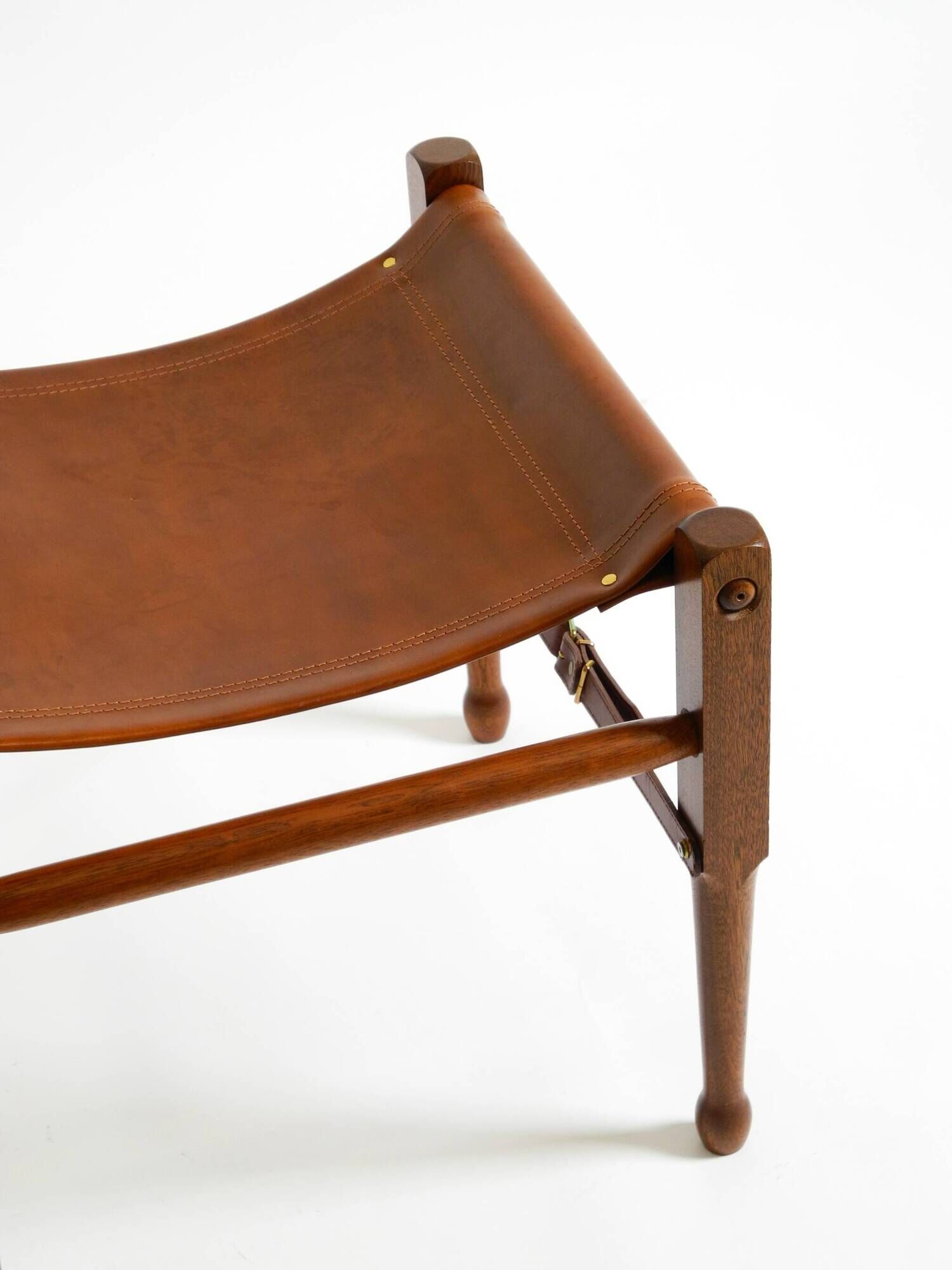 Rare 1990s safari stool with a teak frame and a seat made of brown saddle l