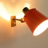 Old and rare Stilnovo wall light, red and black lacquered metal and brass With period label
