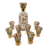 Liqueur service, 1 carafe & 6 small glasses, golden floral decoration.
