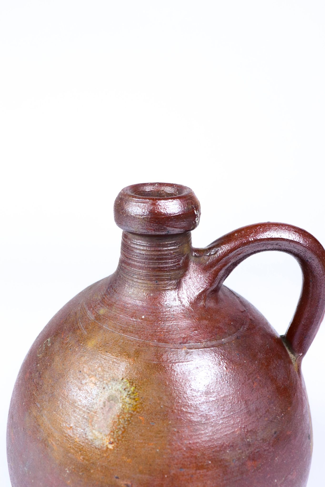 Old enamelled stoneware jug