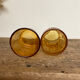 4 mismatched amber glasses
