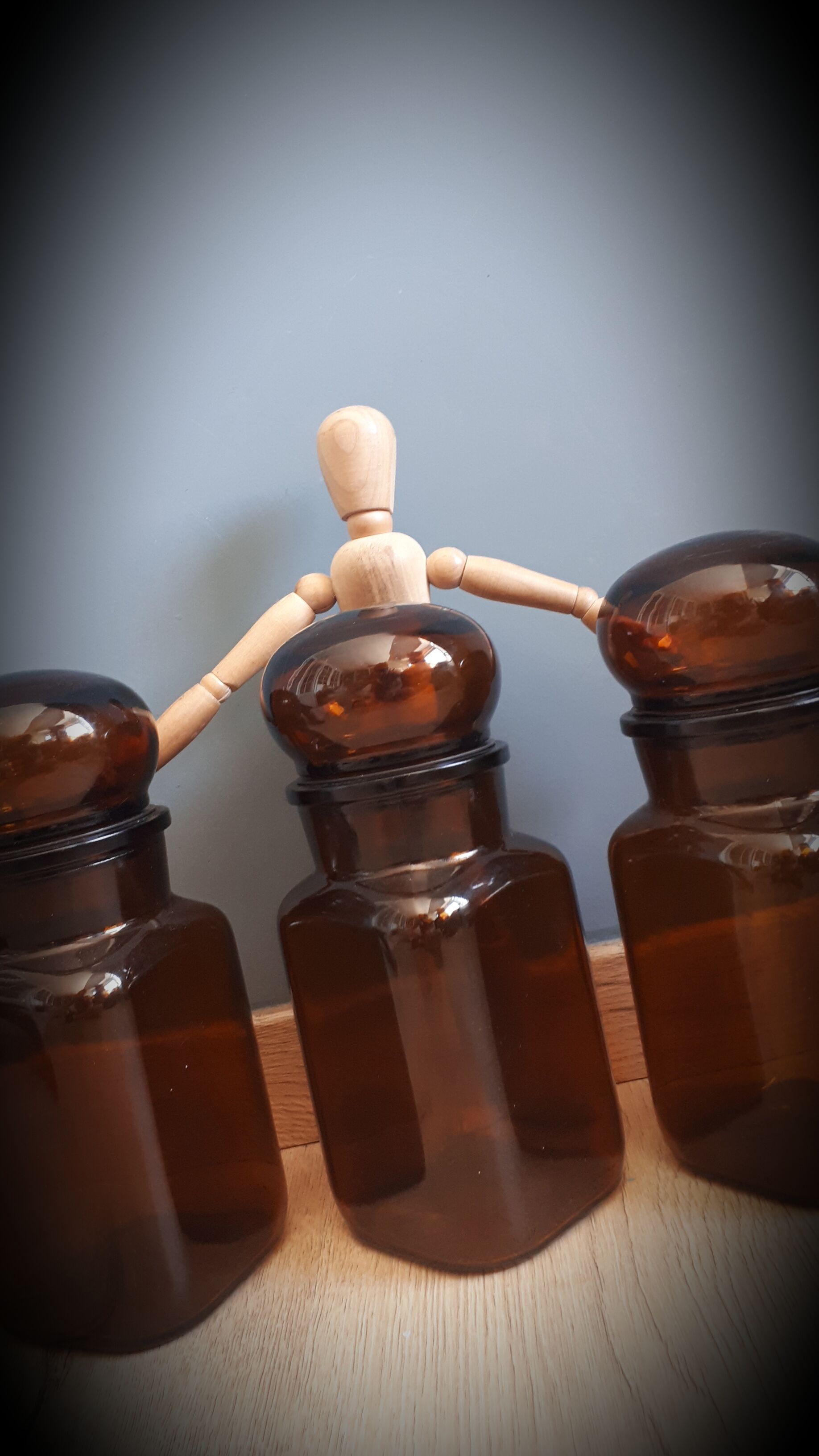 Trio round brown apothecary bottles