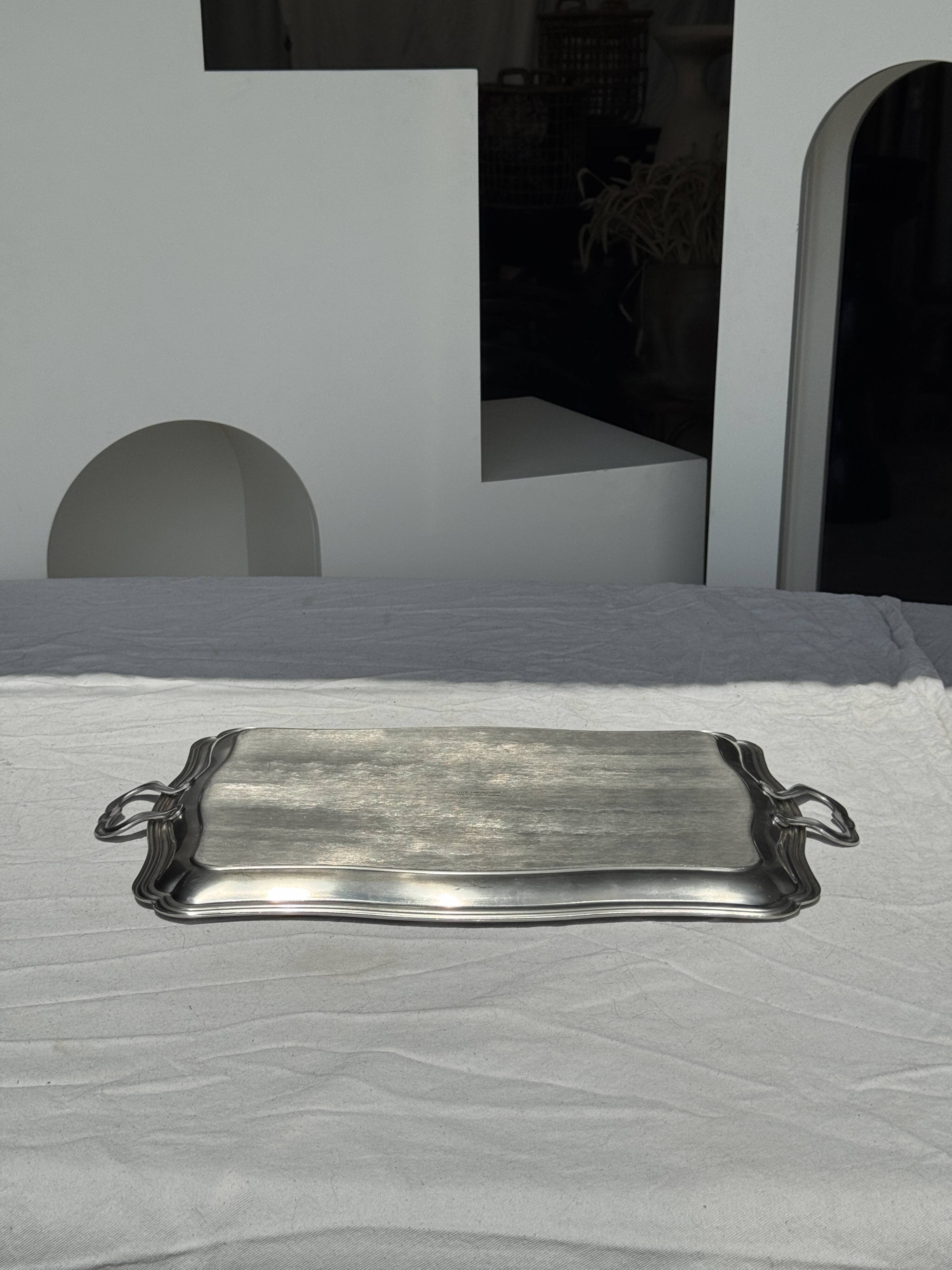 Guy Degrenne silver stainless steel serving tray with an eventful shape