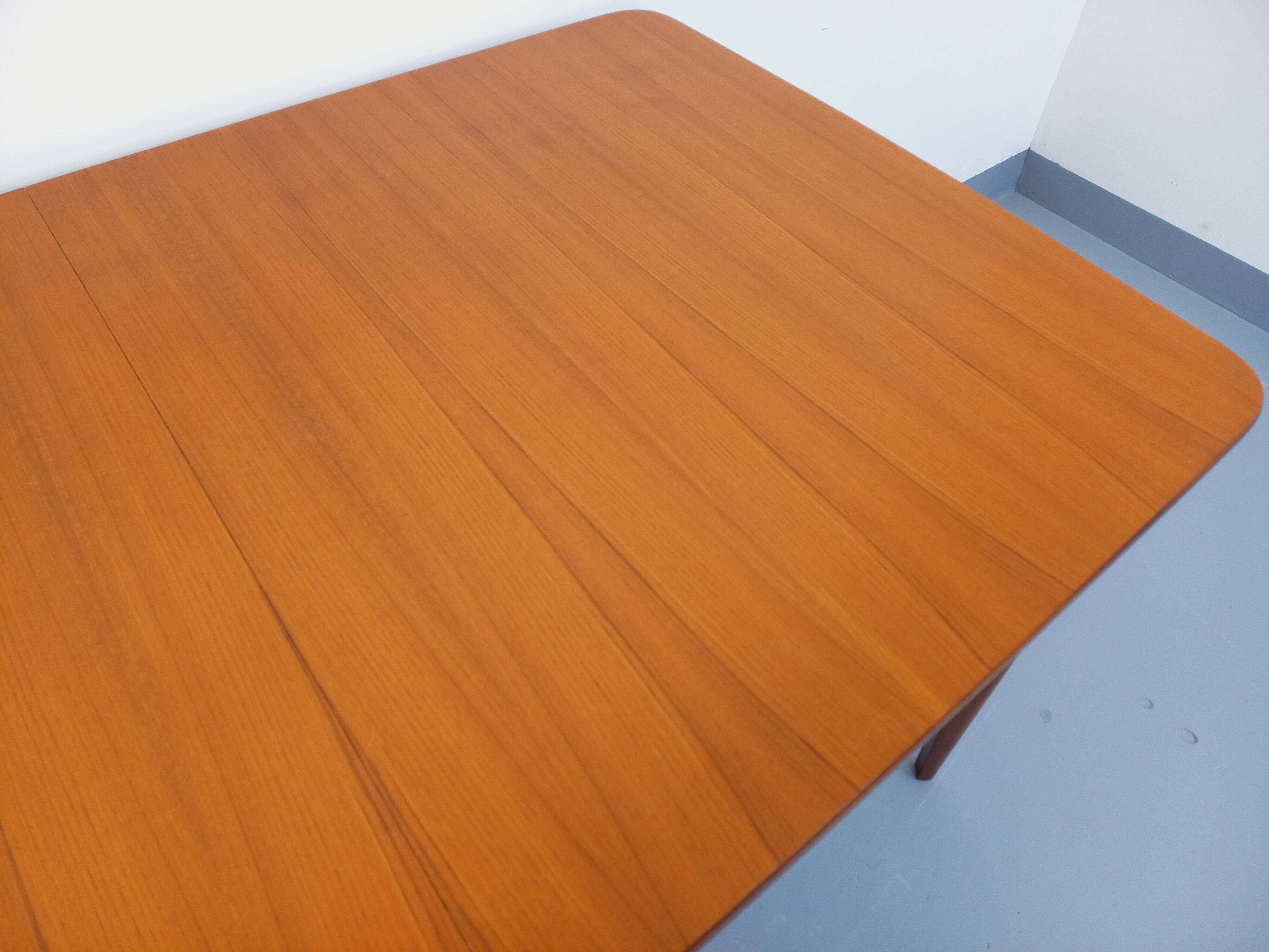 Rectangular dining table in vintage Scandinavian style from the 50s and 60s, made of teak.