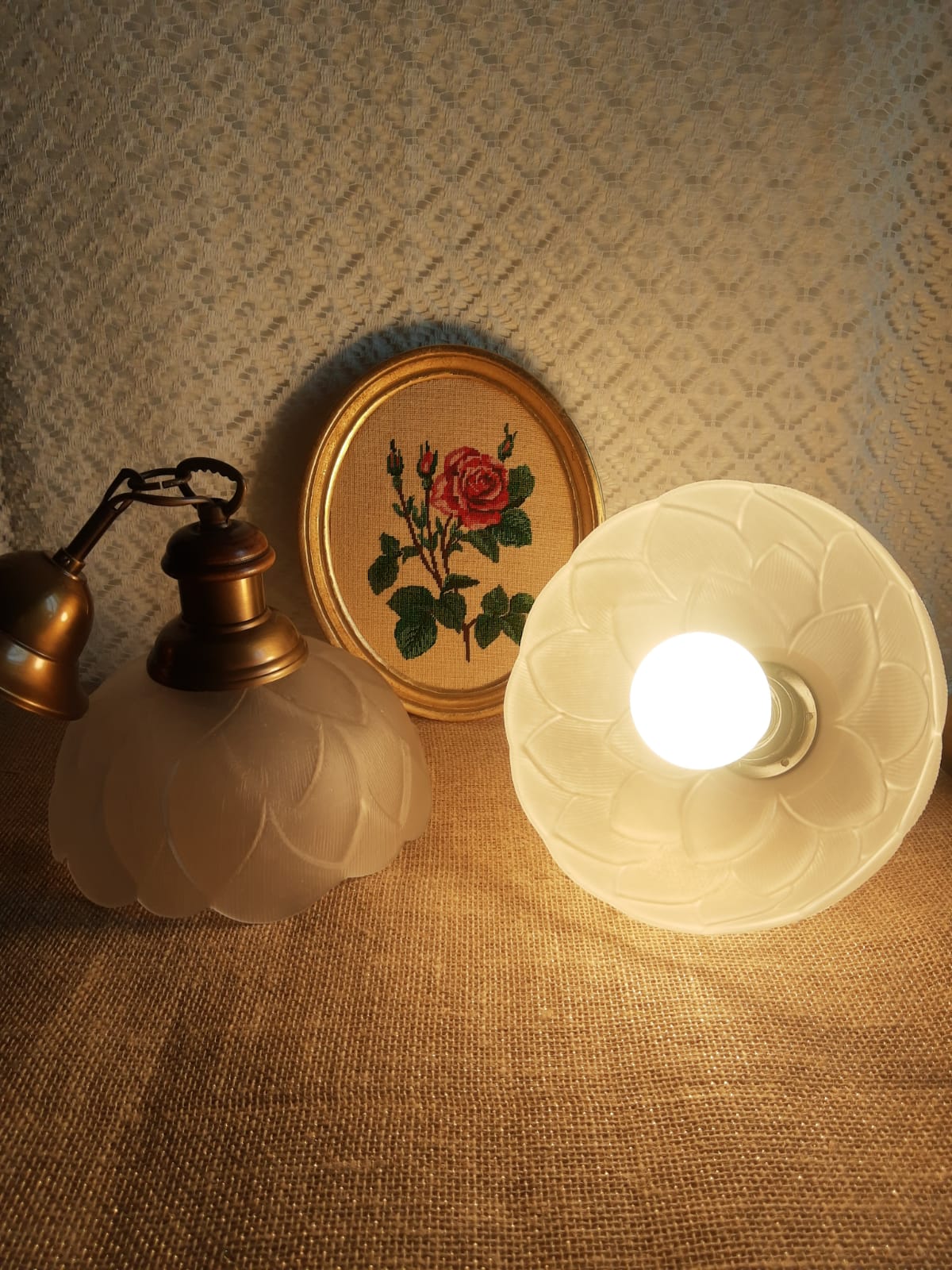 Pair of frosted glass flower pendant lights with vintage wood and brass