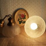 Pair of frosted glass flower pendant lights with vintage wood and brass
