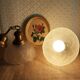 Pair of frosted glass flower pendant lights with vintage wood and brass