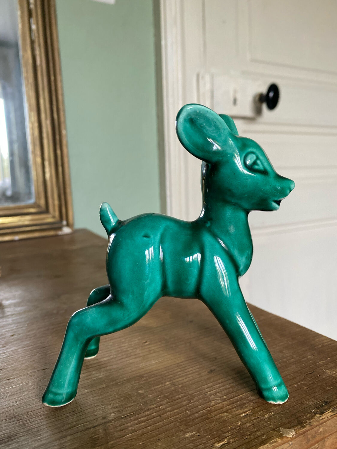 Art Nouveau green glazed ceramic fawn