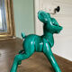 Art Nouveau green glazed ceramic fawn