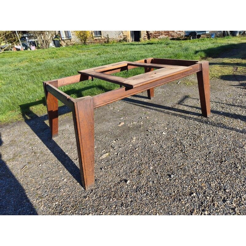 1960s oak dining table with integrated extensions.