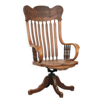 Charming desk chair with beautiful wood carving from the early 20th century