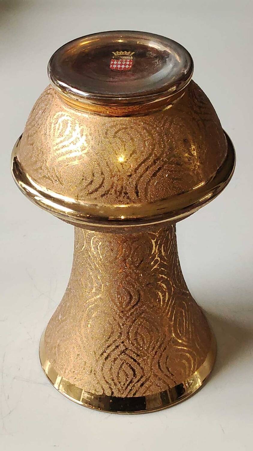 Ball vase stamped Verrerie de Monaco/Monte Carlo. In gold granite glass