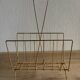 Magazine rack in gold metal and bamboo from the 60s