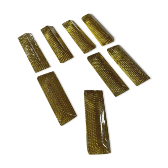 Set of tinted glass knife rests