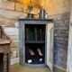 Eighteenth-century corner cabinet with a patina.
