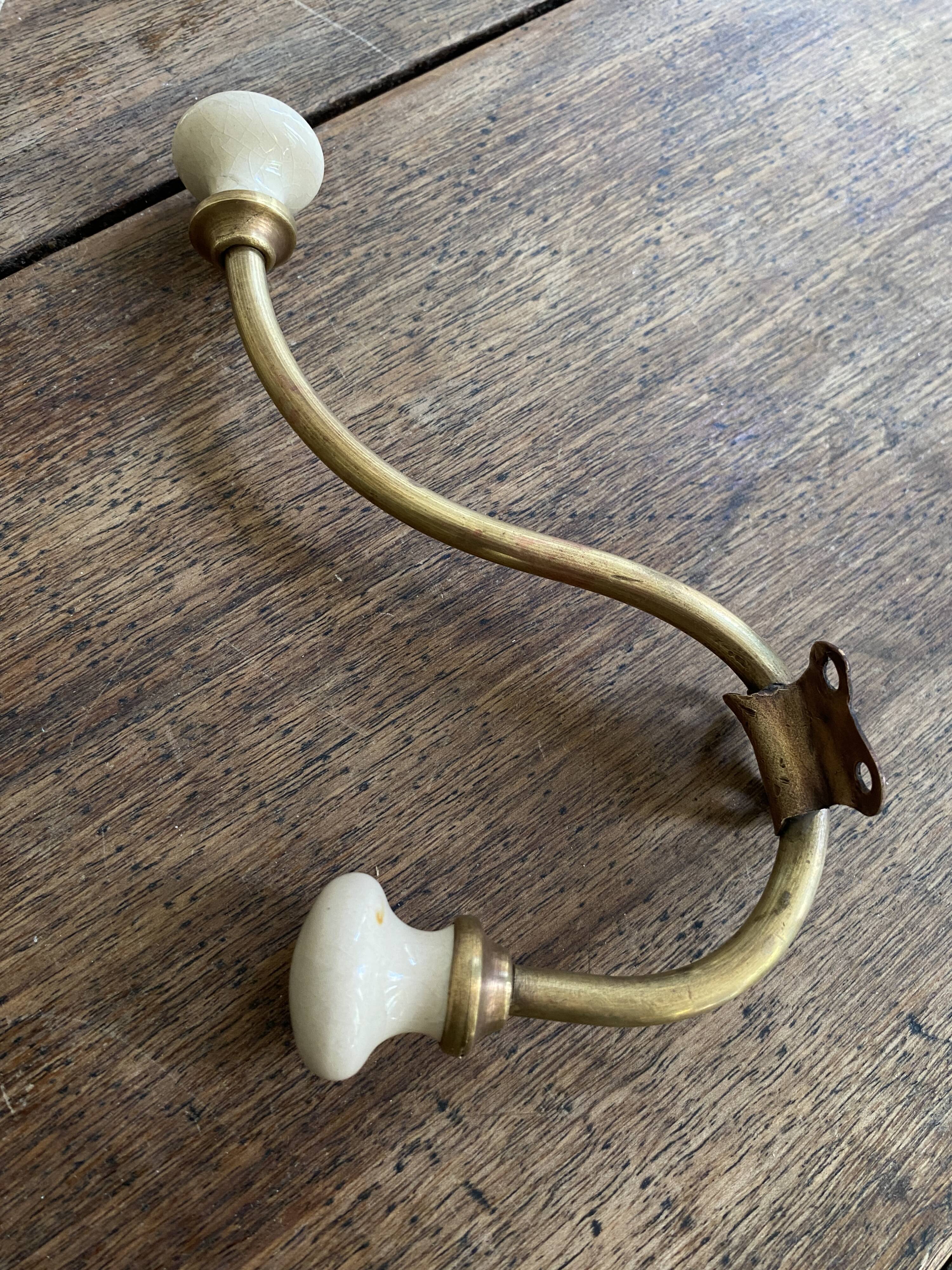 Double coat hook, brass and ceramic