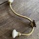 Double coat hook, brass and ceramic