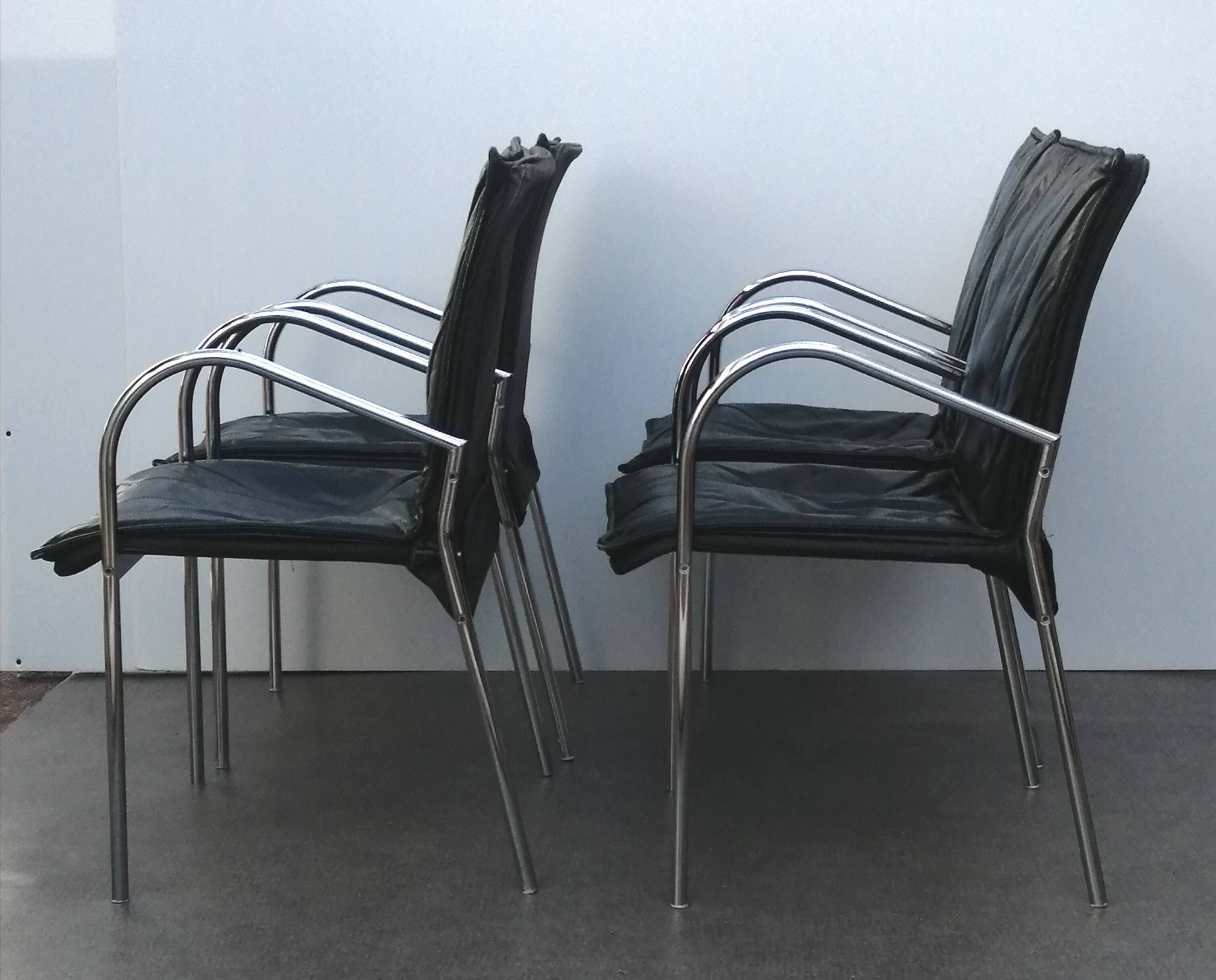 Set of 4 armchairs with chrome base and leather vintage design 1980