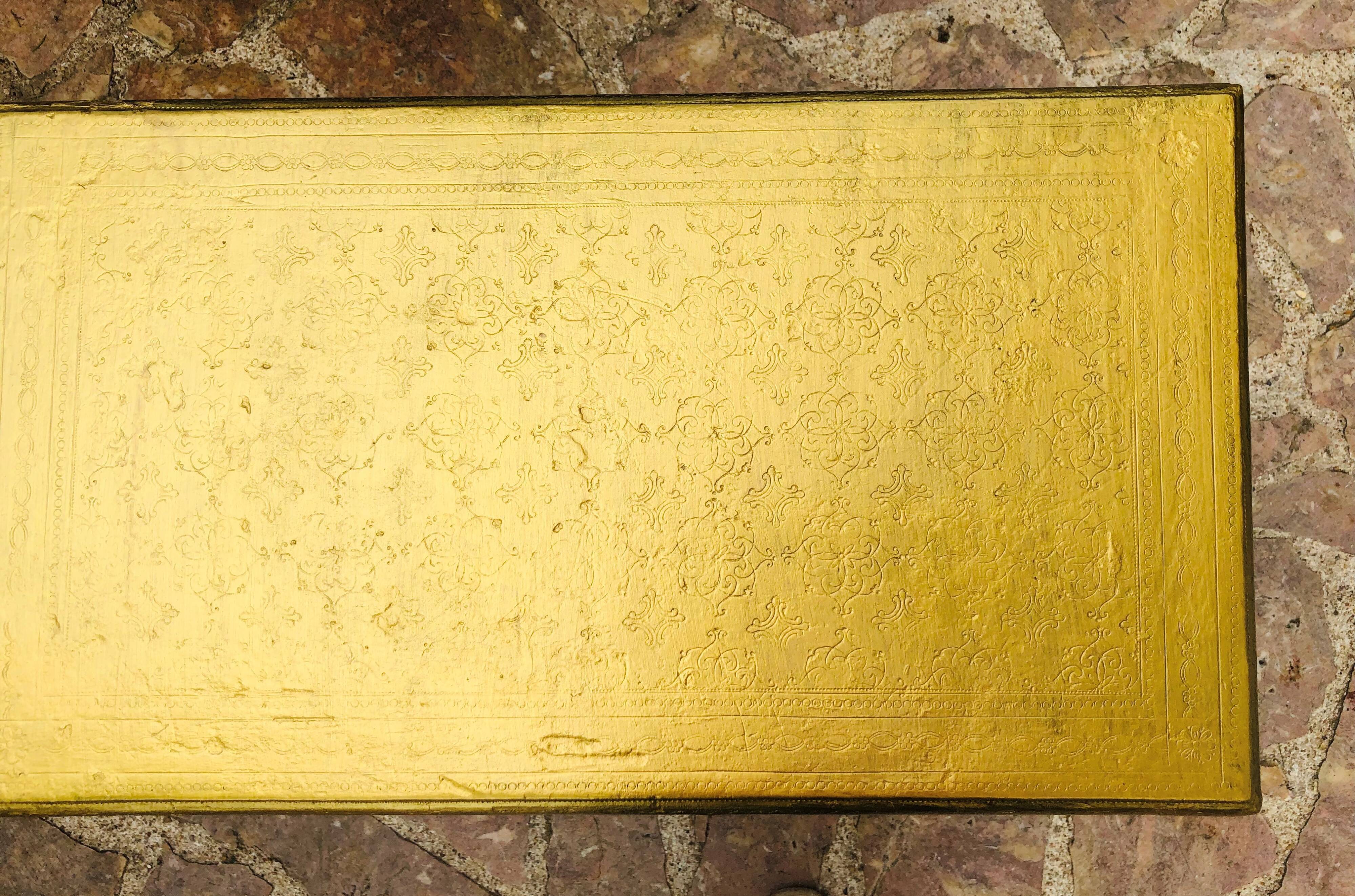 Coffee table in gilded wood