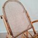 Cane rocking chair and upholstered seat