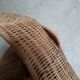 Frog in rattan magazine holder