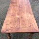 Old cherry farmhouse table with 3 drawers and turned legs