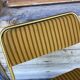 Vintage lafuma folding chair with striped gold fabric