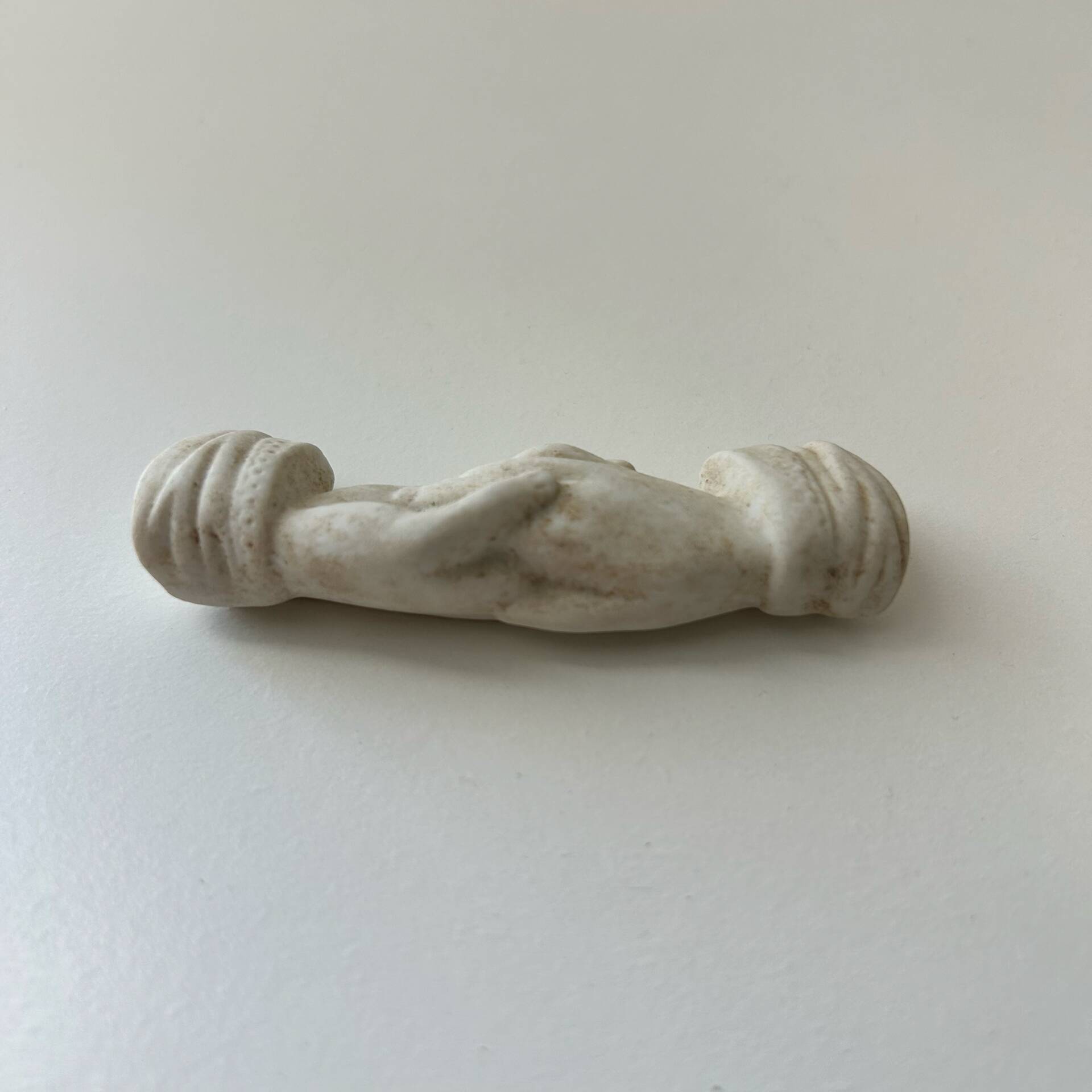Knife holder with hands joined