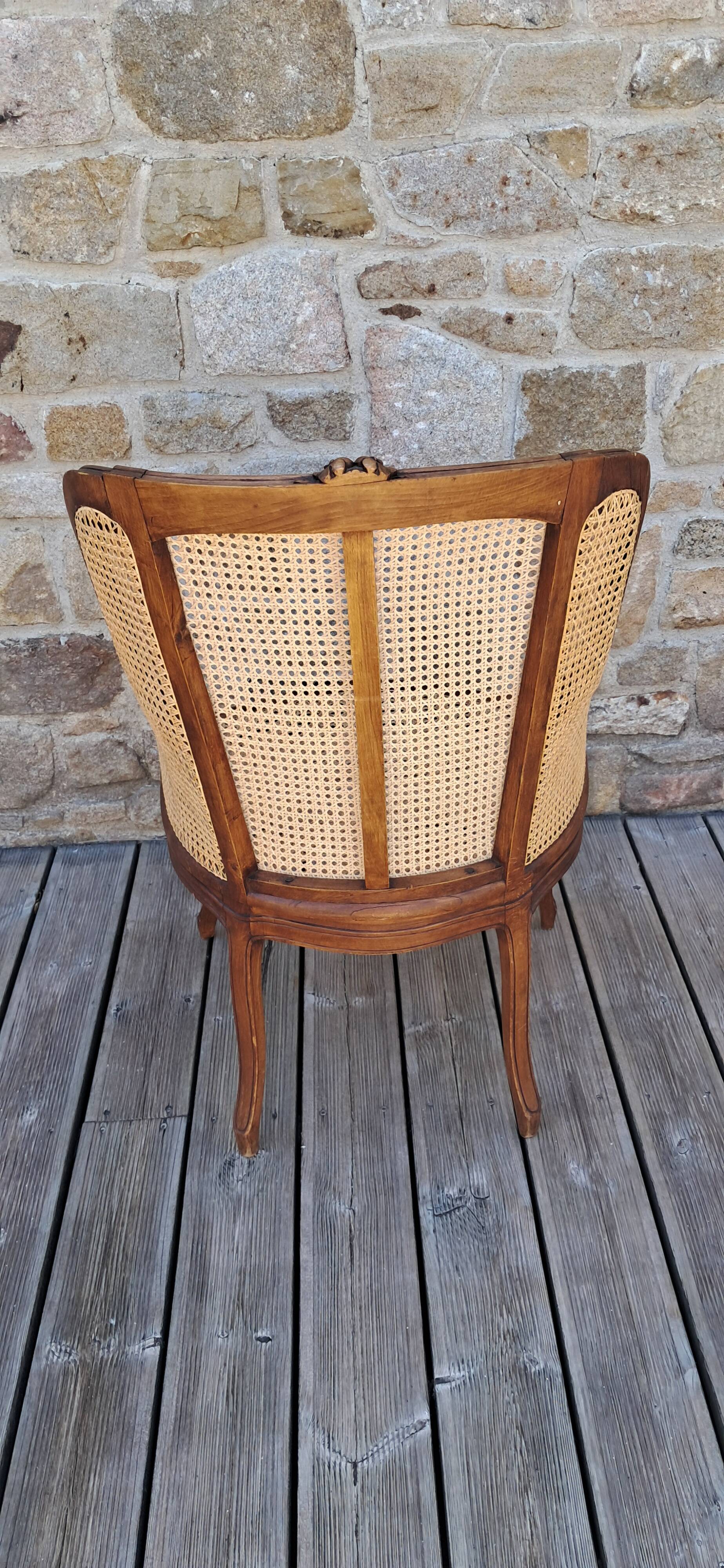 Caned armchair.