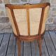 Caned armchair.