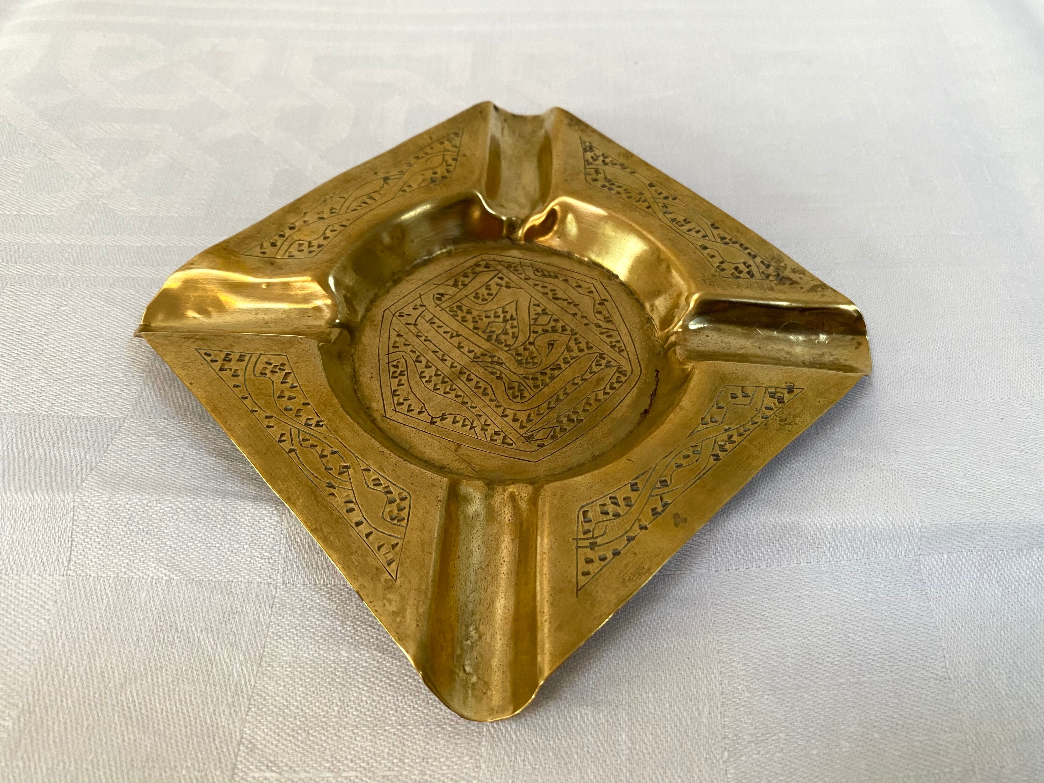 Old brass ashtray
