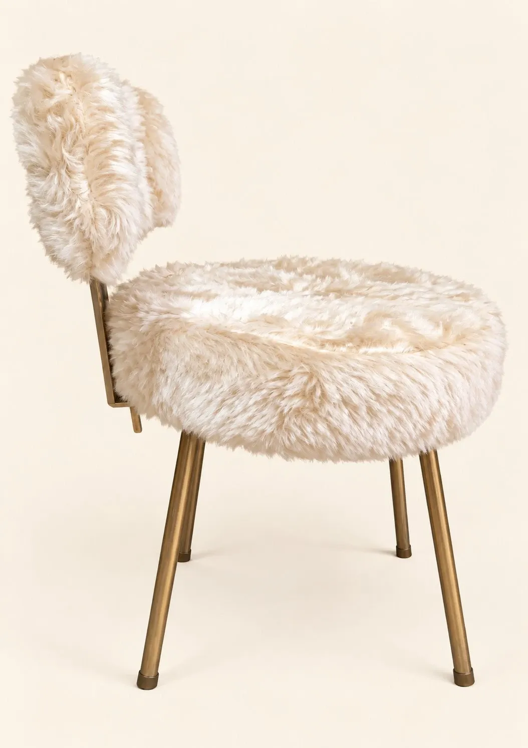Vintage 1960s dressing table chair with faux fur and golden legs.