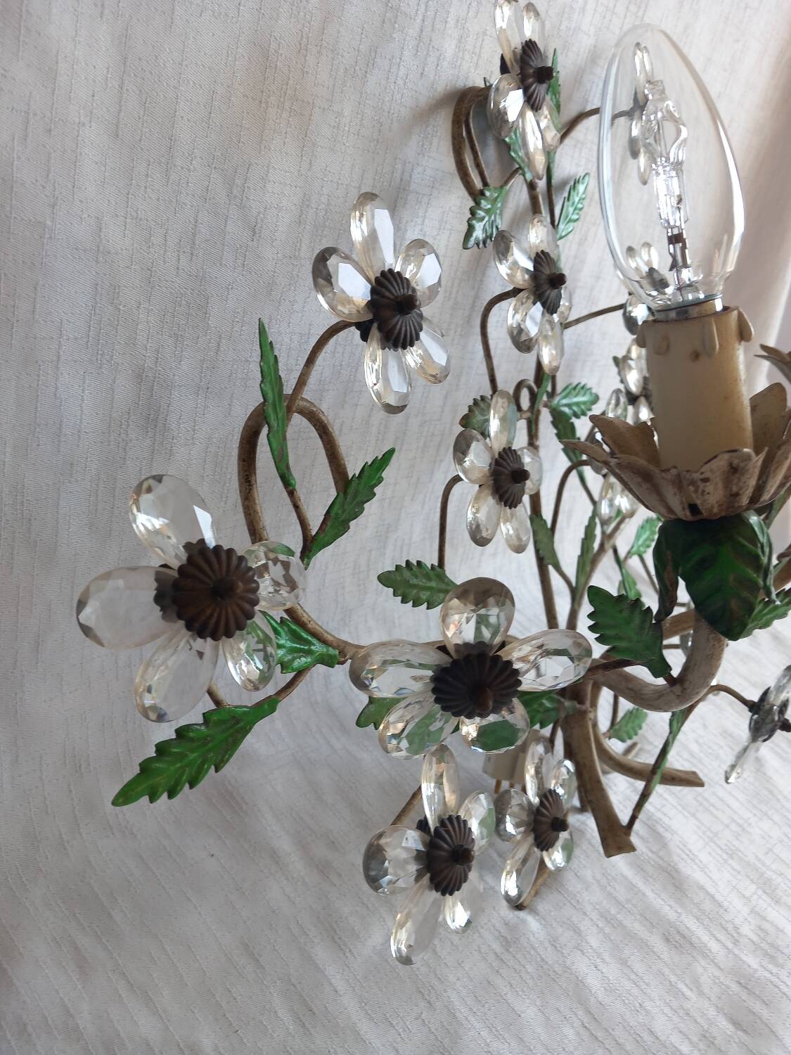 Pair of Italian Florentine wall sconces in tin and glass.