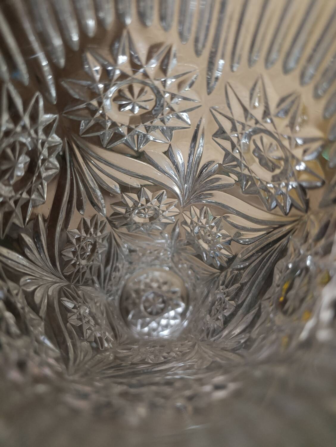 Vintage pressed glass vase, a decorative and elegant piece.