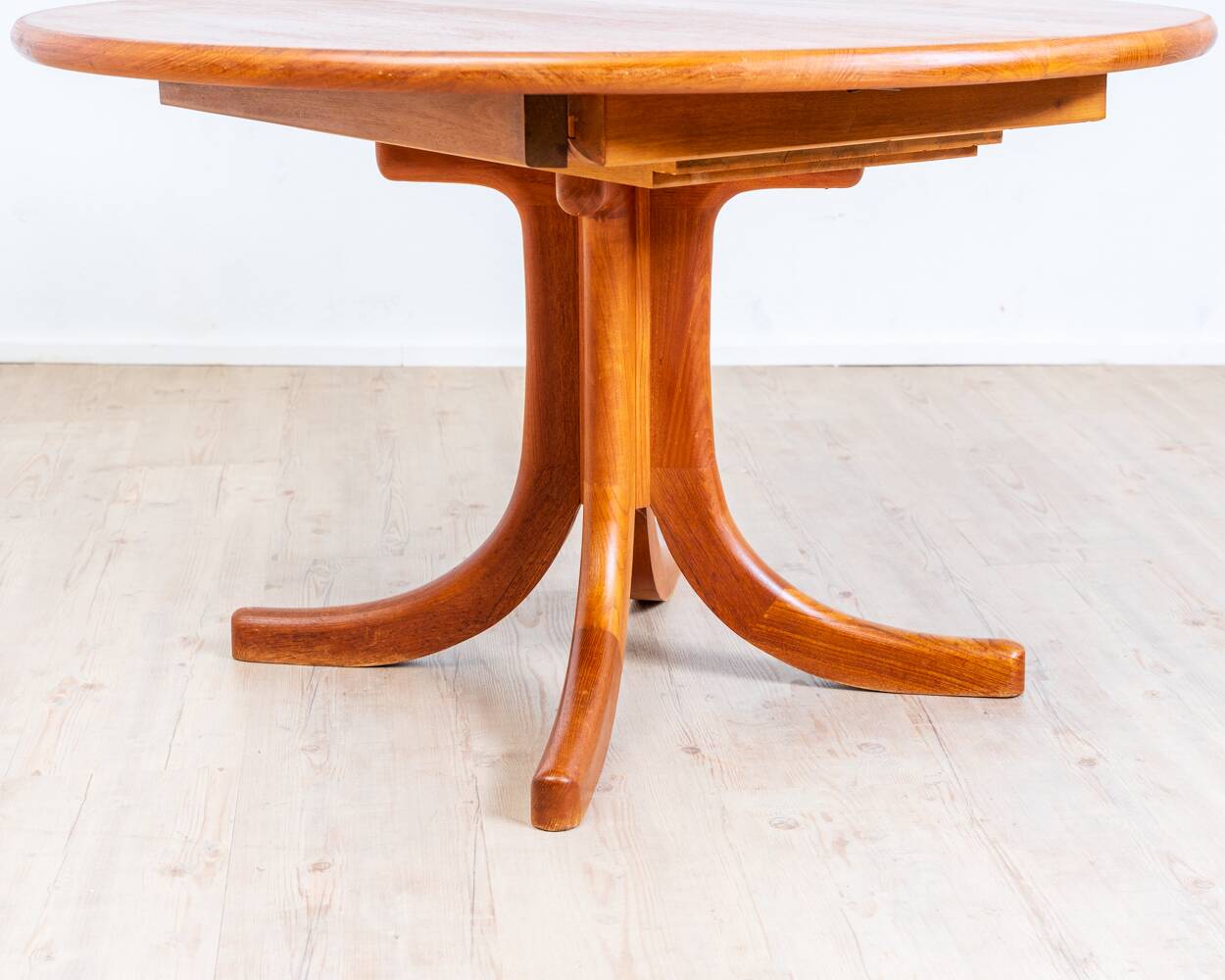 1970s solid teak dining table with Scandinavian design.