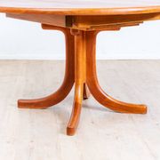 1970s solid teak dining table with Scandinavian design.