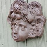 Child's face sculpture