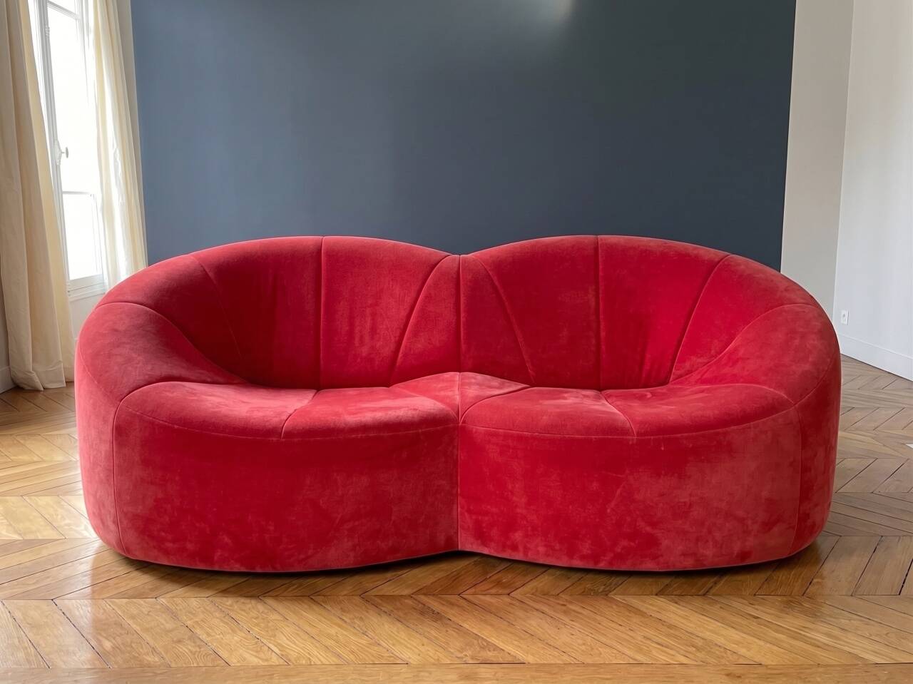 Two-seater pumpkin canapé by Pierre Paulin in red, very good condition.