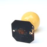 Metal hook, yellow wood ball, 50s